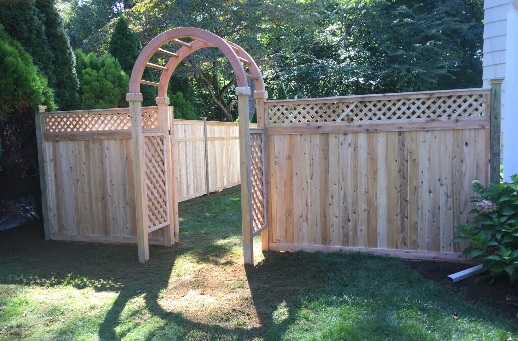 Arbor With Lattice Top Tongue and Groove Fence